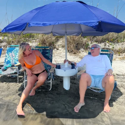 Swimbrella floating pool umbrella table is also great for use on the beach for shade on the sand